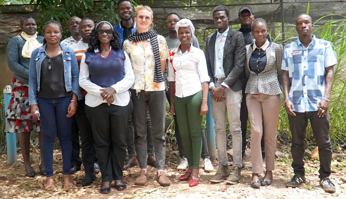 Peace Journalism Foundation team members and journalists standing together outdoors